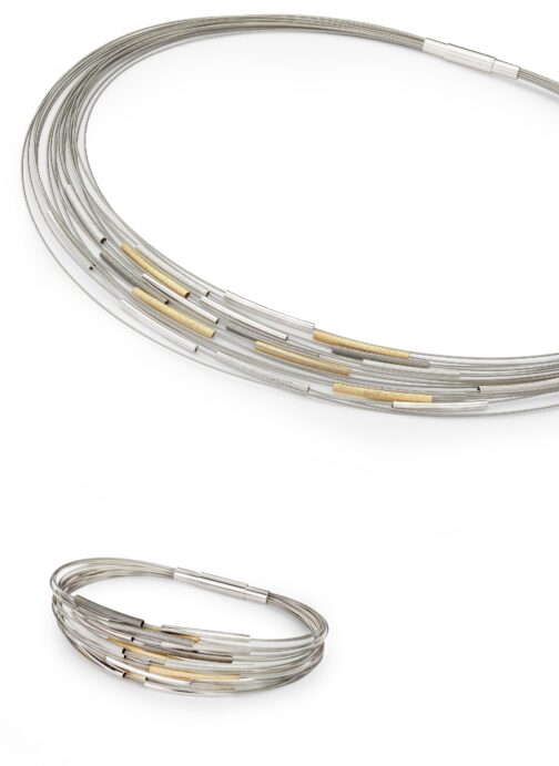 Silver and gold multi-strand necklace jewelry.