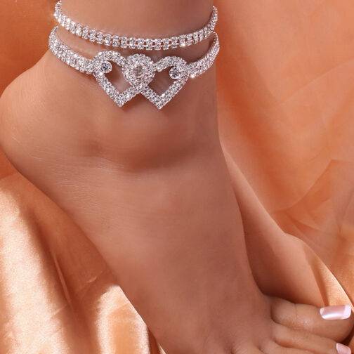 Elegant diamond ankle bracelet on woman's ankle.