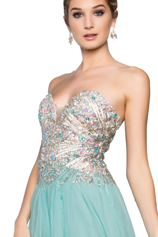 Woman in embellished teal evening gown