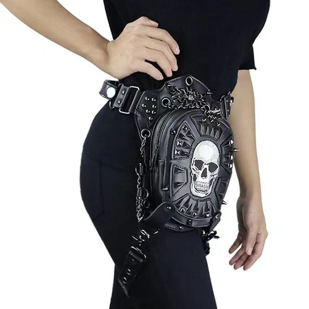 Woman with edgy skull-design black hip bag.
